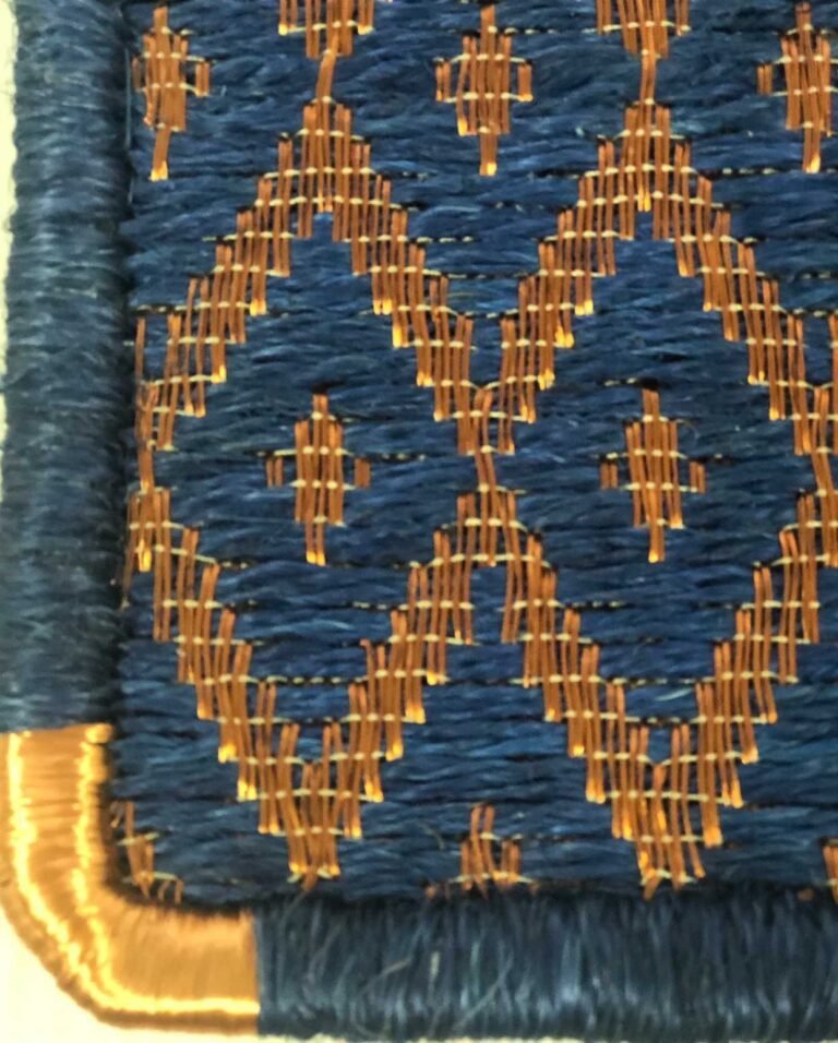 Muestra de tapete tejido en fique + cobre